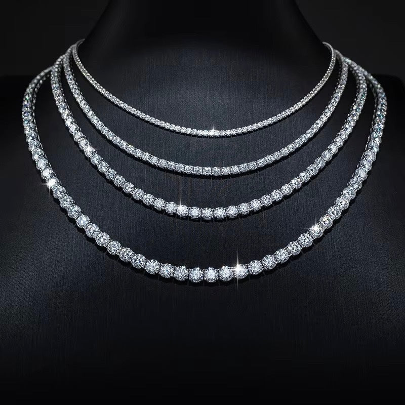 Iced out tennis chain in a silver-tone finish