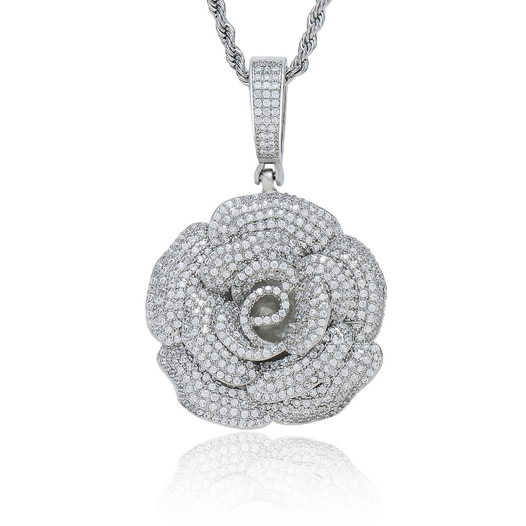 Silver-tone iced rose flower pendant on a white background