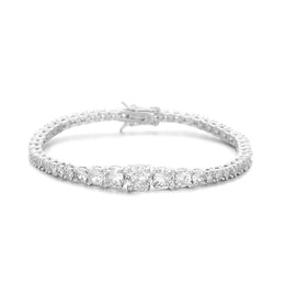 Silver-tone graduated tennis bracelet on white showing the larger center stones