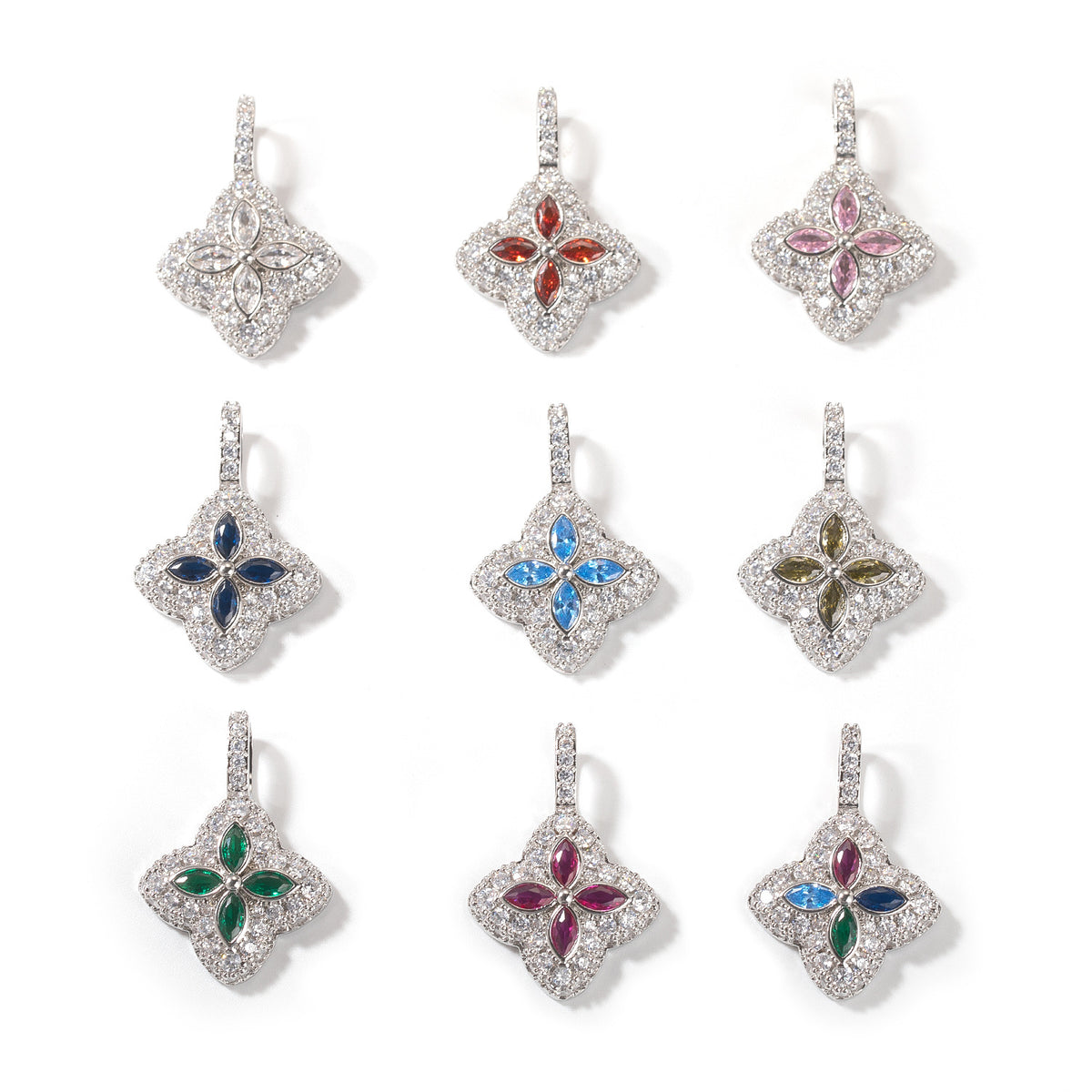 Ten silver-tone four-leaf clover pendant color options arranged on white