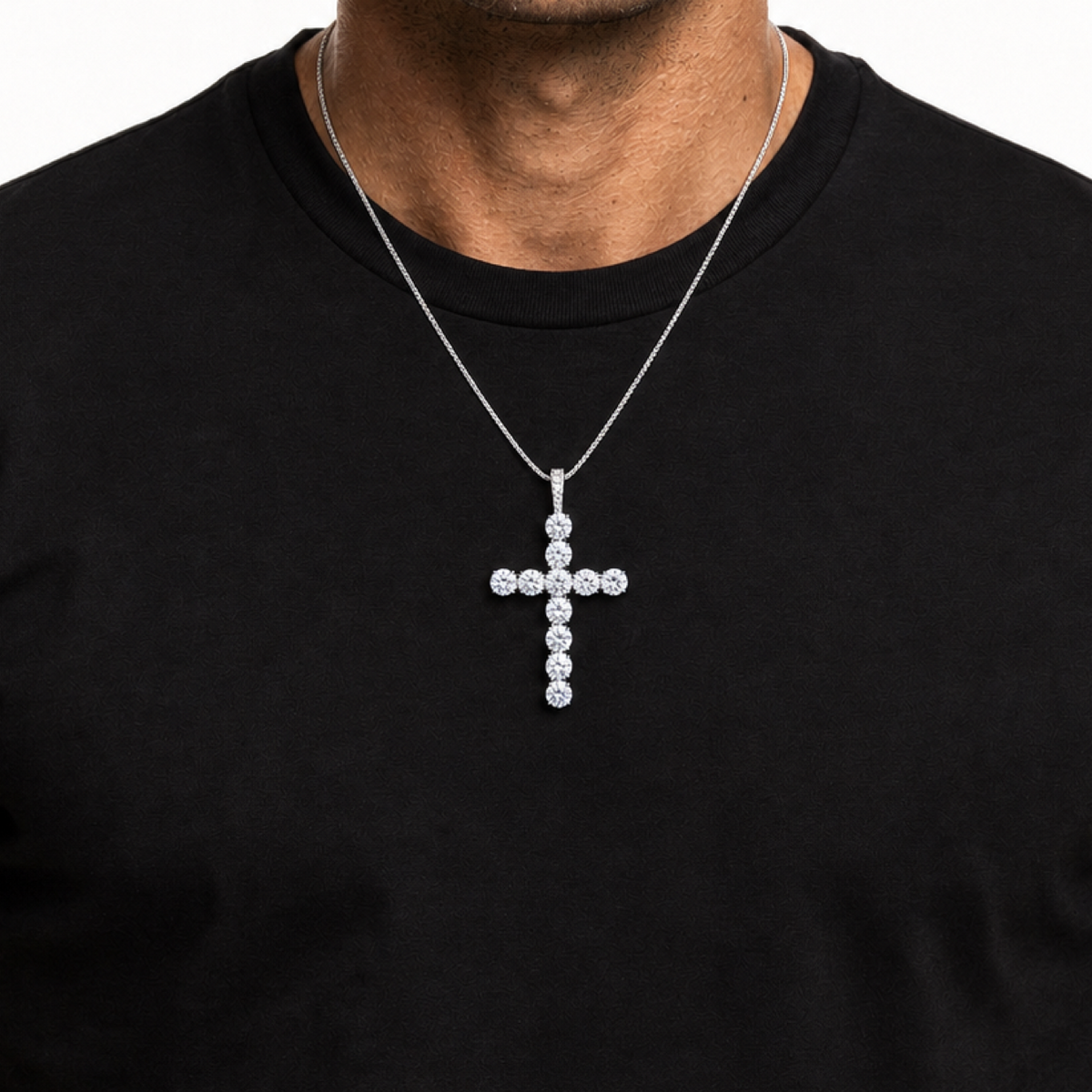 6.5mm moissanite cross pendant worn on a black shirt