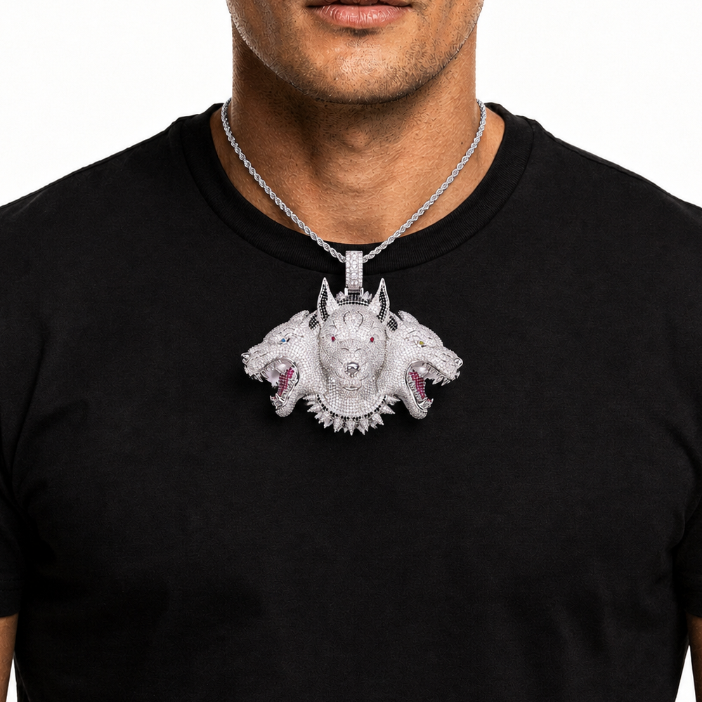 Silver iced Cerberus three-head pendant worn centered on a model