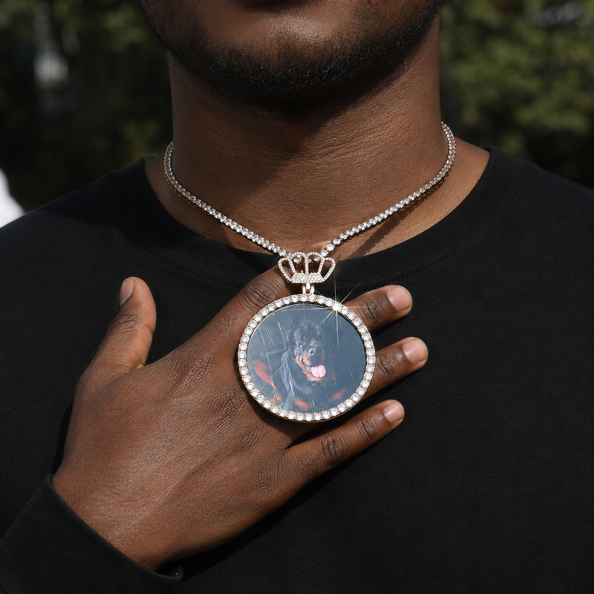A model wearing a 68mm crown photo pendant