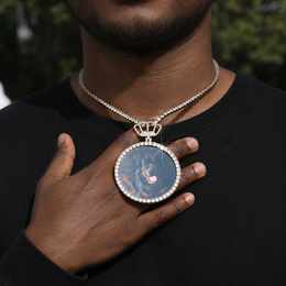 A model wearing a 68mm crown photo pendant