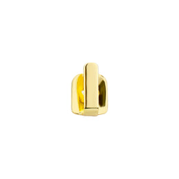 Gold smooth tooth cap with a raised vertical bar on white