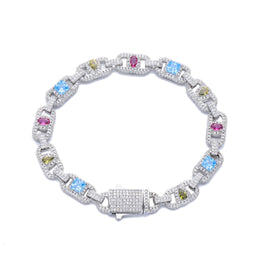 Silver-tone multicolor open link bracelet with a stone-set box clasp on white