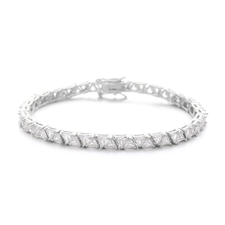 Silver-tone triangle tennis bracelet with its clasp visible on white