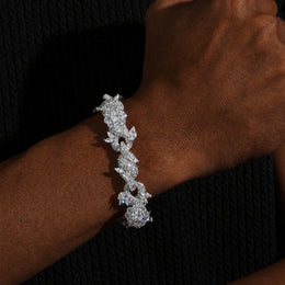 15mm iced flower Cuban bracelet worn on a deep-brown wrist
