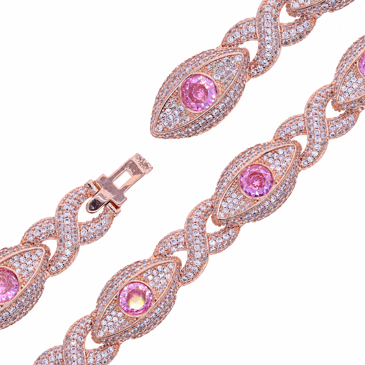 Close-up of pink eye motifs, clear pave stones, infinity links and open hidden clasp