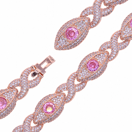 Close-up of pink eye motifs, clear pave stones, infinity links and open hidden clasp