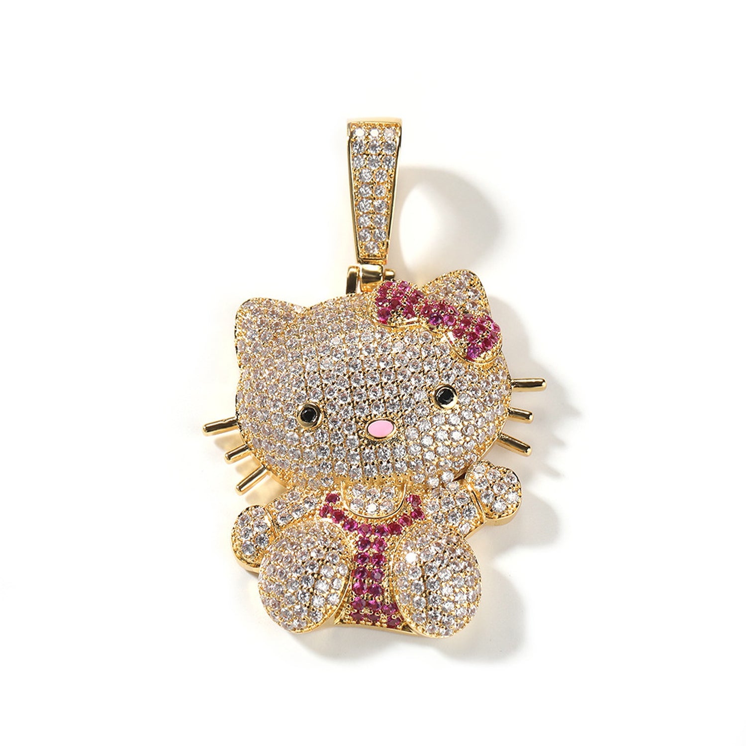 Gold iced pink bow cat pendant with clear cubic zirconia on white