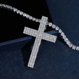 Silver iced moissanite cross pendant angled close-up