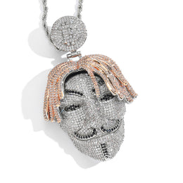 Angled view of iced mask pendant with rose gold tone hair details