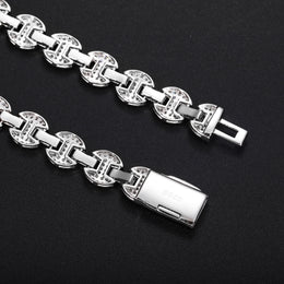 Reverse of silver-tone mariner links and the open box-clasp mechanism