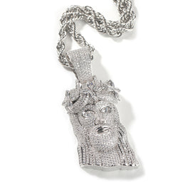Silver-tone crowned portrait pendant with clear stones