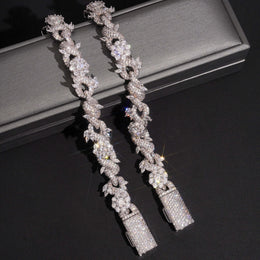 Detailed view of 15mm silver iced flower Cuban chains