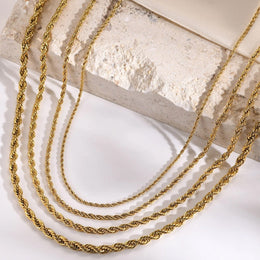 Gold titanium steel twist chain necklace close-up detail