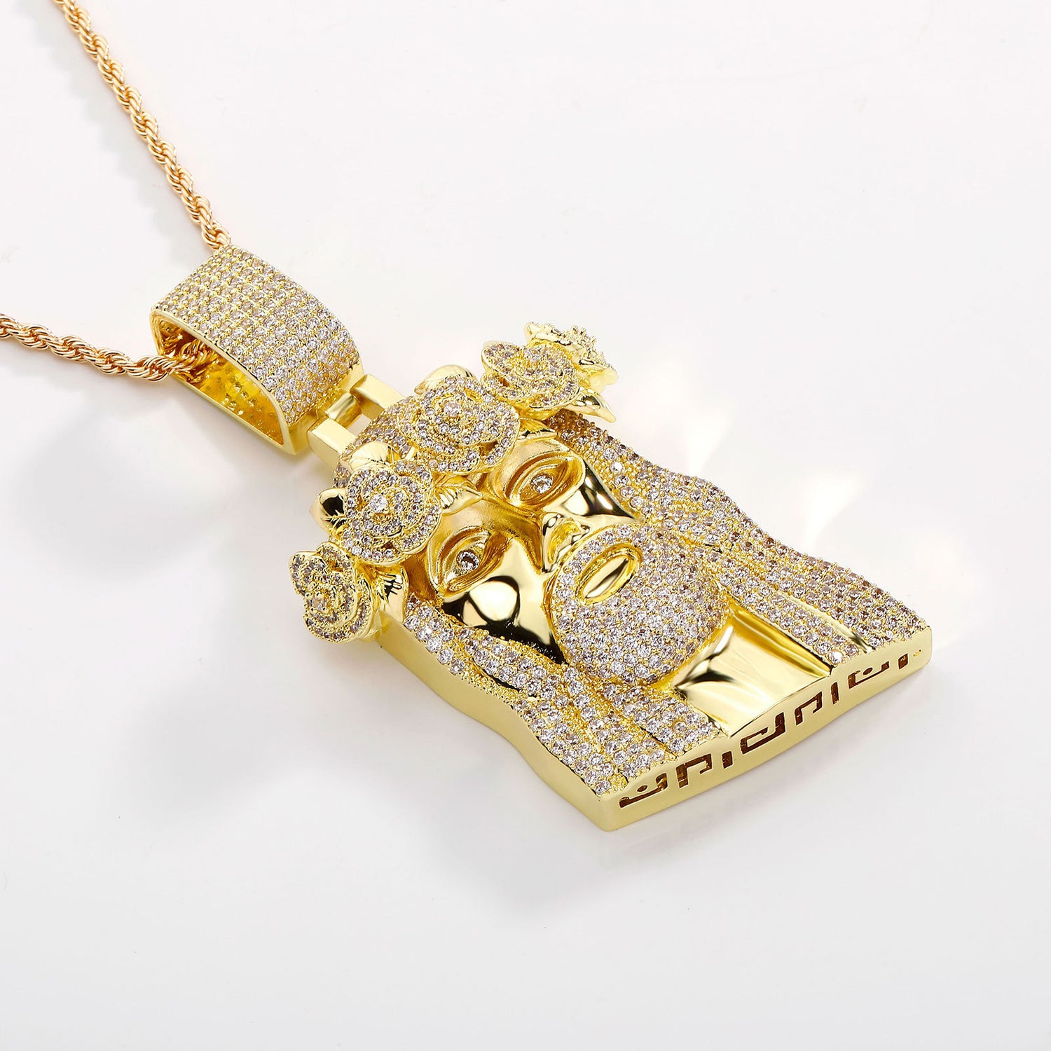 Gold iced Jesus Piece pendant angled view