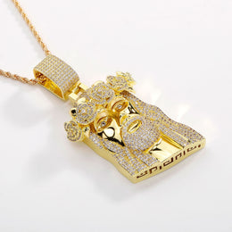 Gold iced Jesus Piece pendant angled view