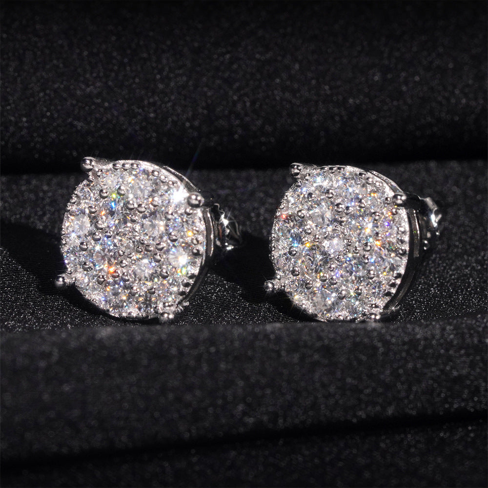 Silver ice crystal moissanite stud earring pair on black fabric