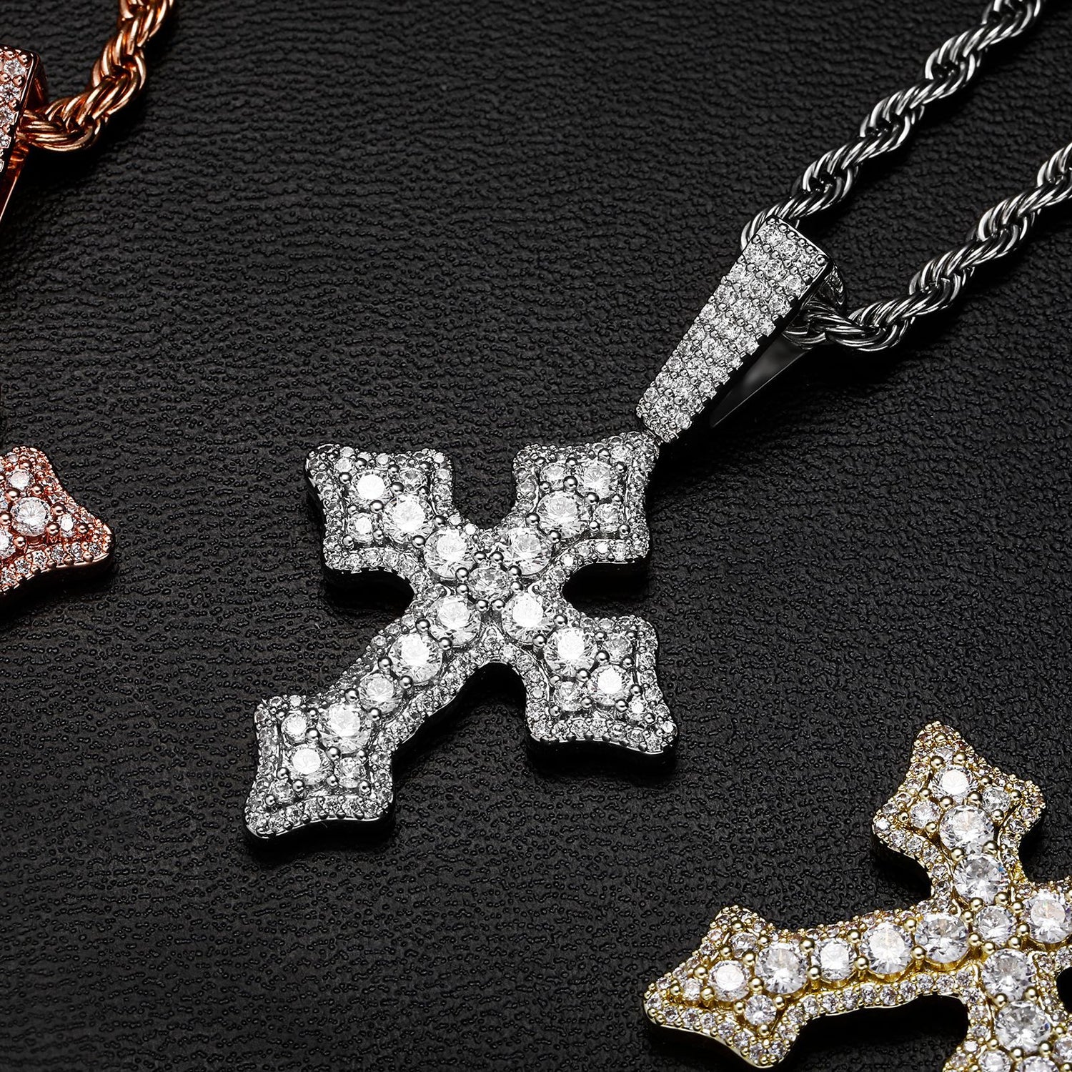 Silver iced vintage cross pendant close-up