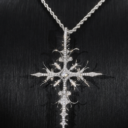 Silver iced thorn cross pendant front presentation on black