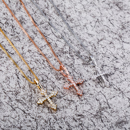 Three 925 sterling silver ornate cross pendant finishes on stone