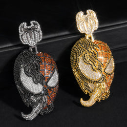 Two-Tone and gold-tone iced split-face pendants on black
