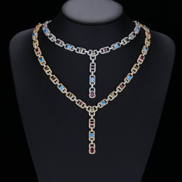 Silver- and gold-tone multicolor lariat necklaces displayed on a black bust