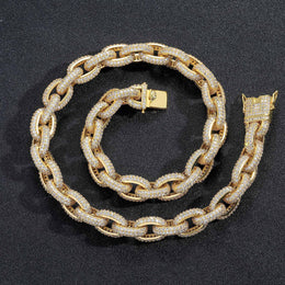 Gold iced O-link chain and bracelet on black