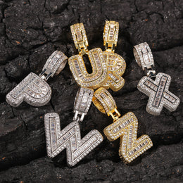 Gold and silver iced baguette initial pendant assortment