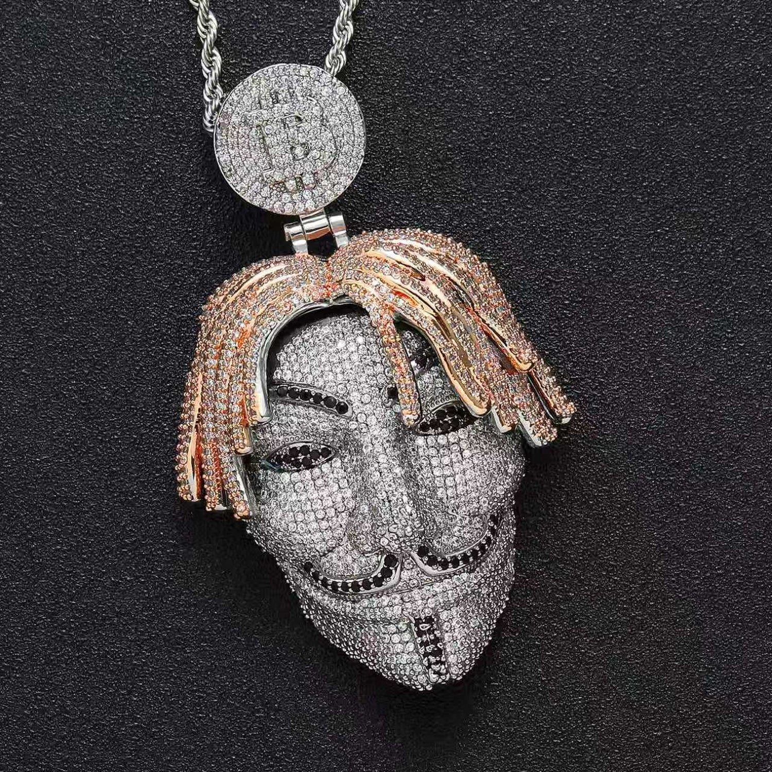 Iced mask pendant with multicolor cubic zirconia on black fabric