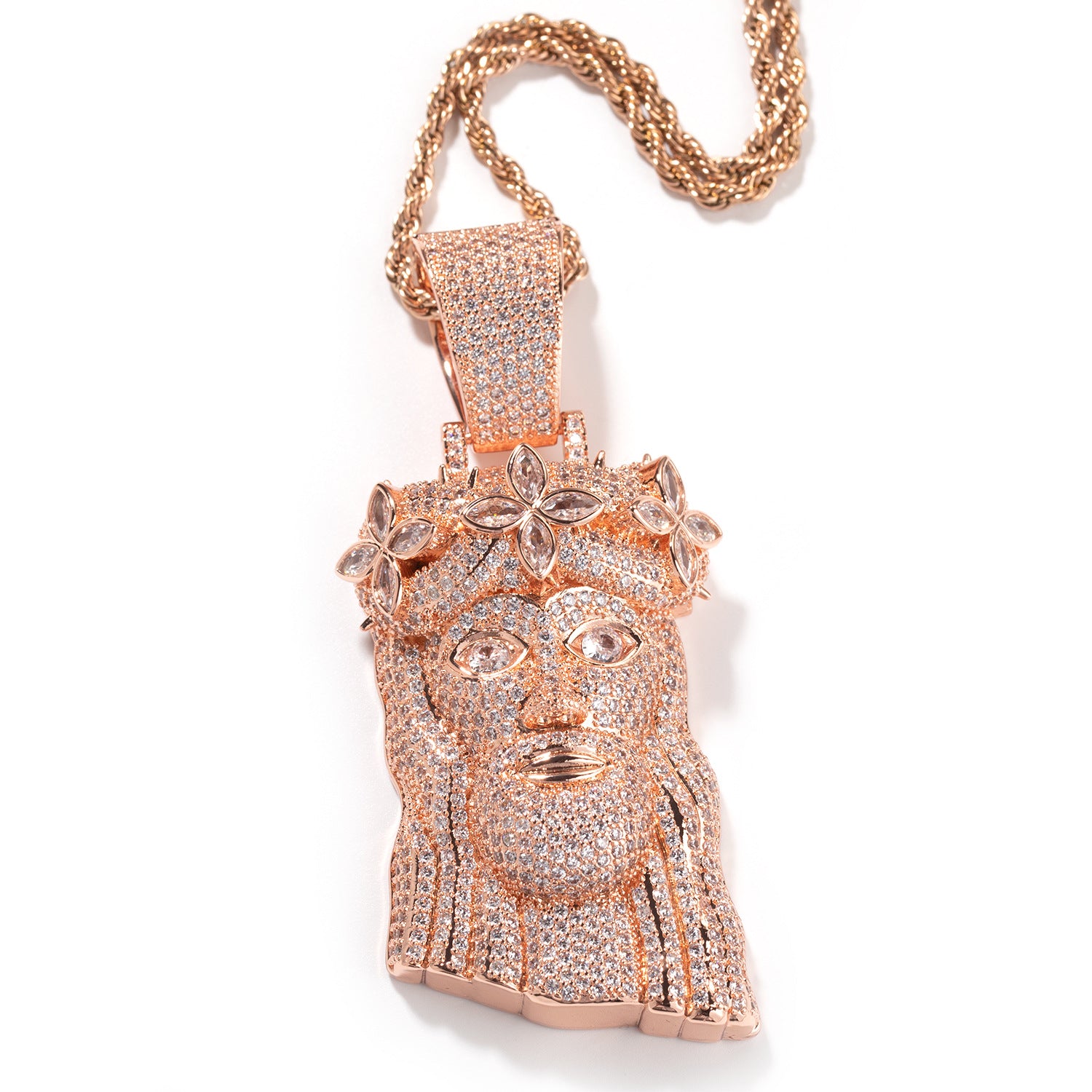 Rose gold-tone crowned portrait pendant with clear stones