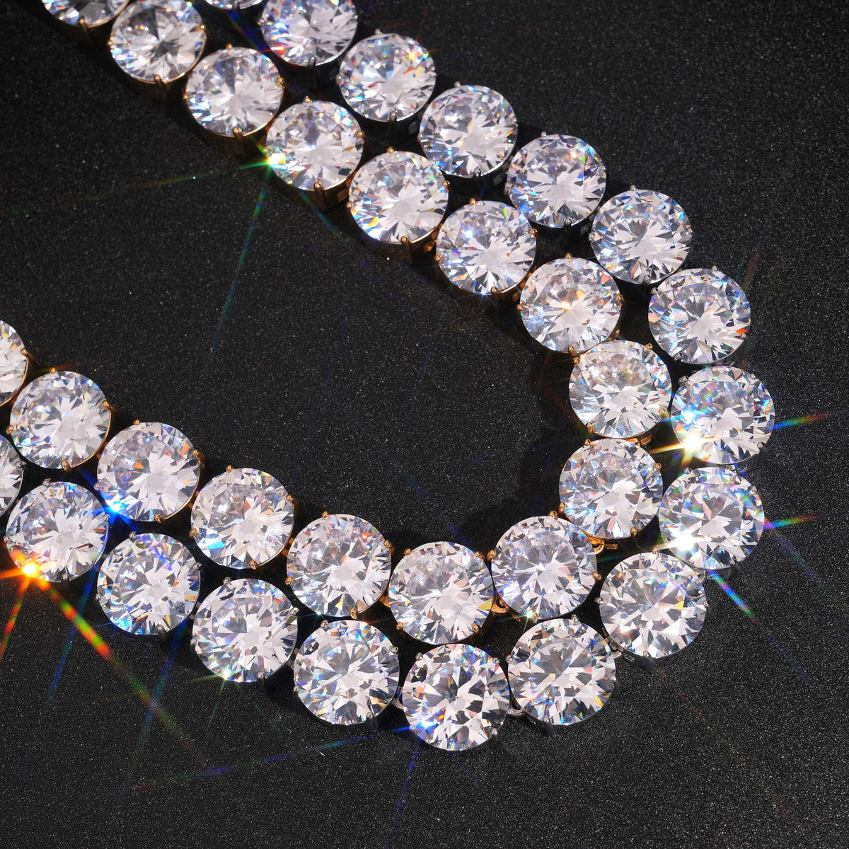 Close-up of silver round cubic zirconia four-prong tennis links