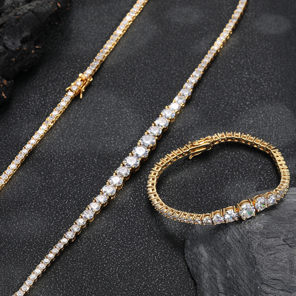 Gold-tone graduated tennis necklace and matching bracelet showing the settings