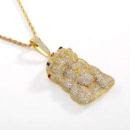 Gold iced out Jesus Piece pendant angled detail