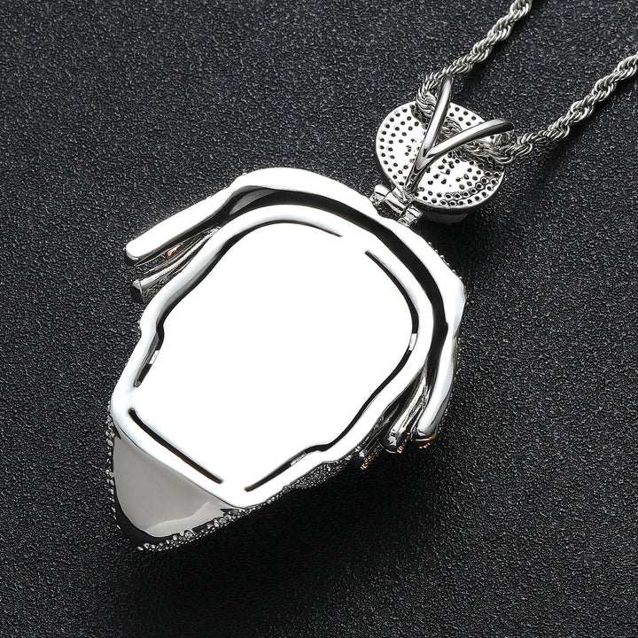 Polished back view of iced mask pendant and Bitcoin bail