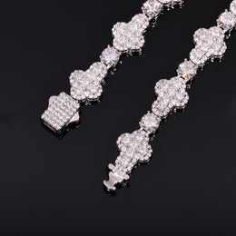 Close-up of moissanite cross links, round connector stones and the stone-set box clasp