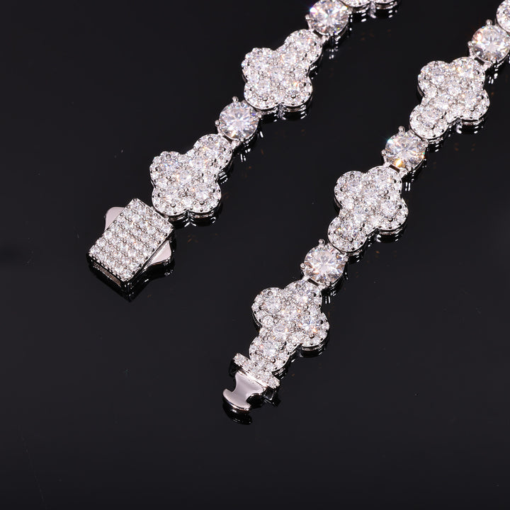 Close-up of moissanite cross links, round connector stones and the stone-set box clasp