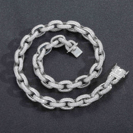 Silver iced O-link chain and bracelet on black