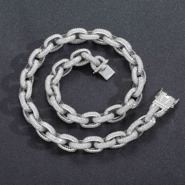 Silver iced O-link chain and bracelet on black