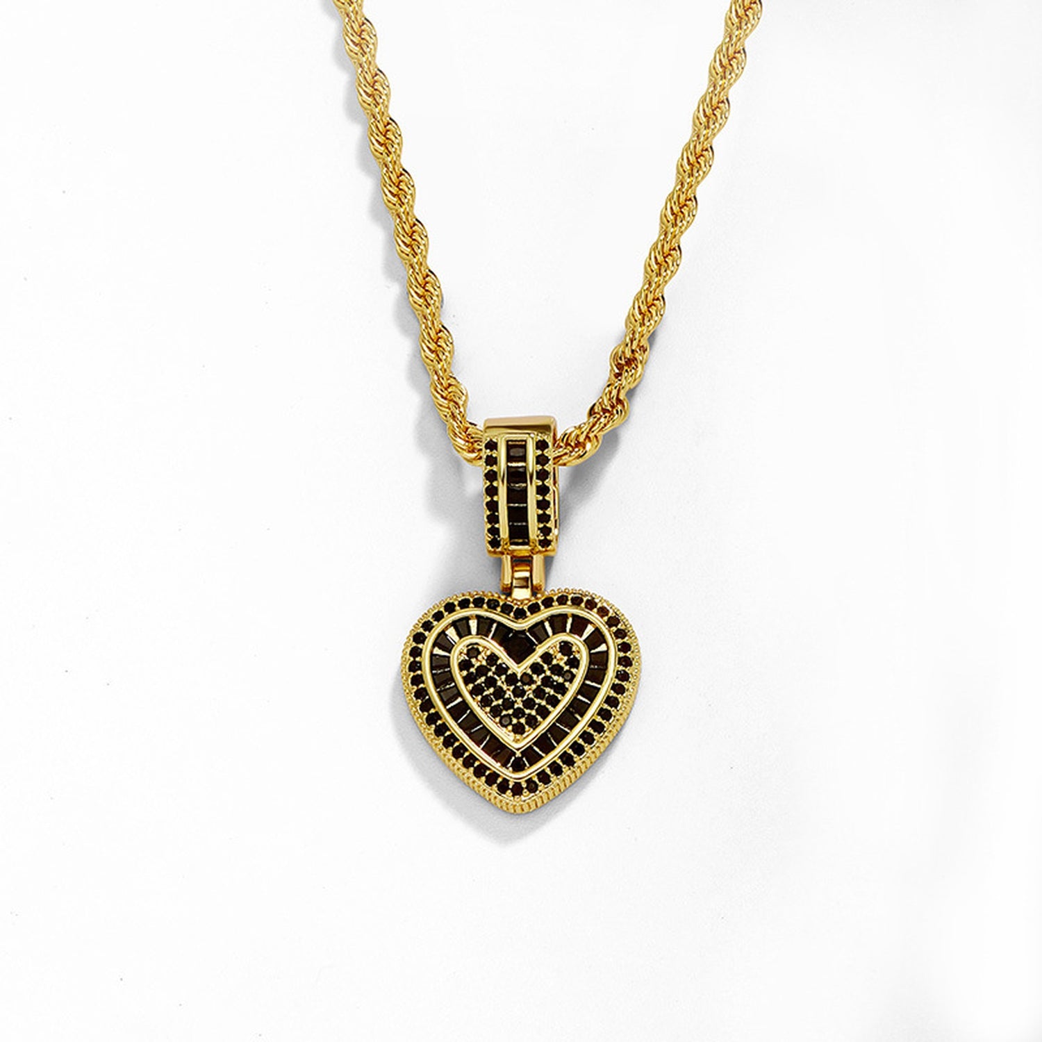 Gold baguette iced double heart pendant with black cubic zirconia