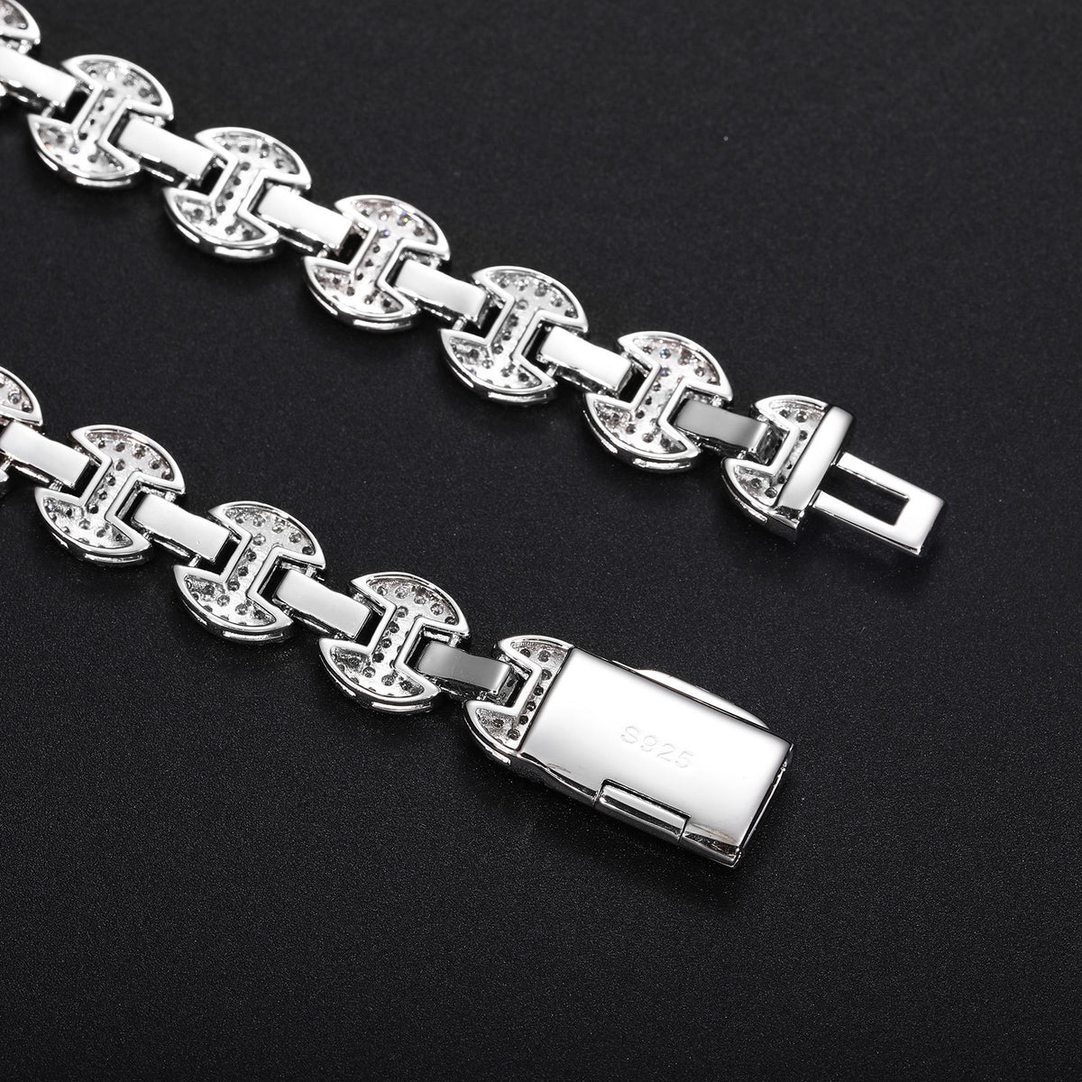 Reverse of silver-tone mariner links and the open box-clasp mechanism