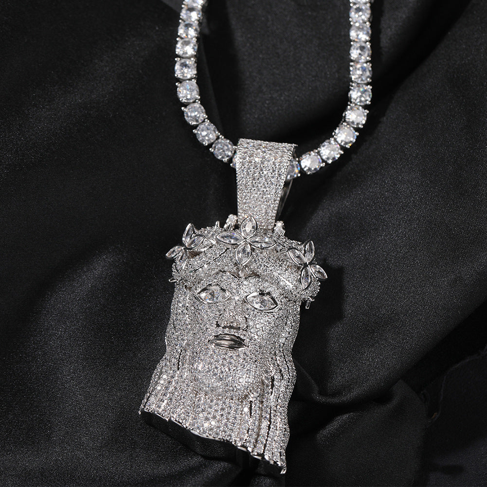 Silver-tone crowned portrait pendant with clear stones on black fabric