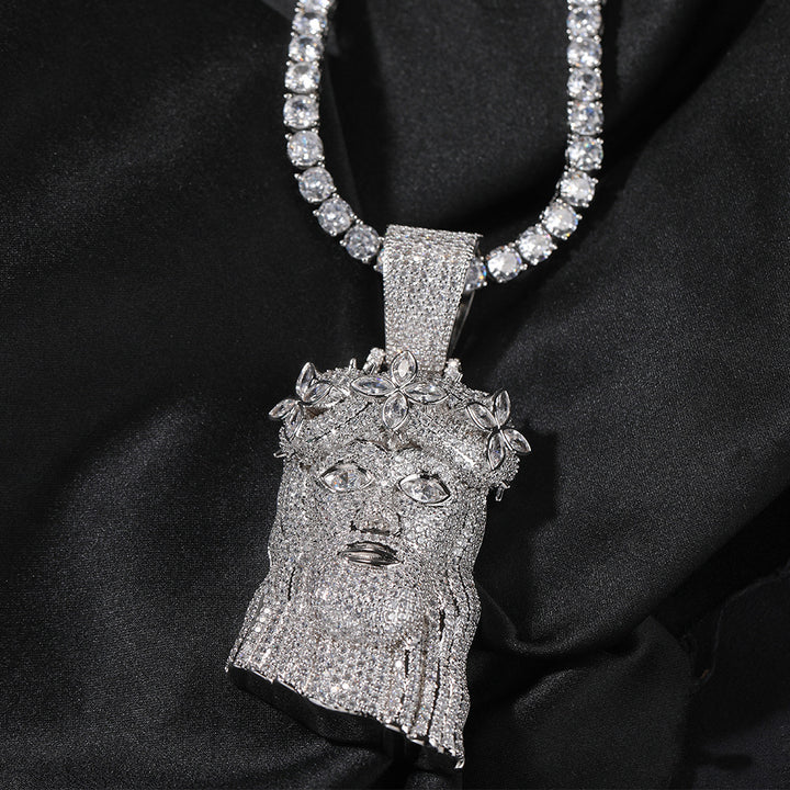 Silver-tone crowned portrait pendant with clear stones on black fabric