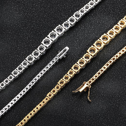 Open-backed settings and clasps on silver- and gold-tone graduated tennis jewelry