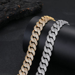 Gold- and silver-tone Cuban links showing their pavé outward faces