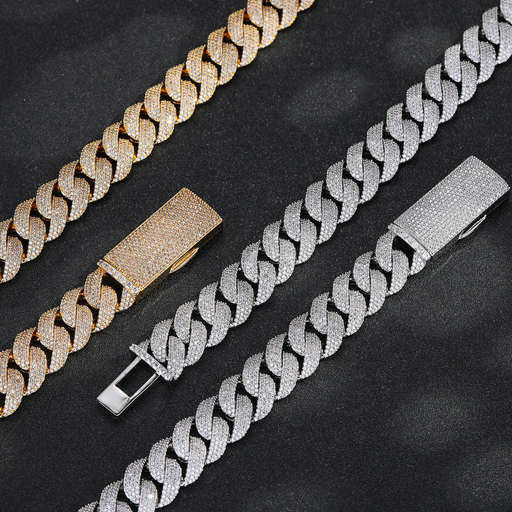 Pavé box clasps on gold- and silver-tone Cuban chains, with the silver clasp open