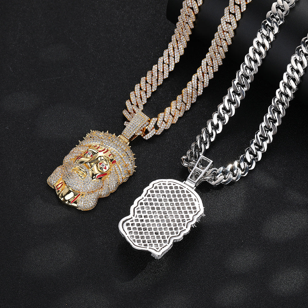 Gold-tone front and silver-tone back views of the iced Jesus pendant