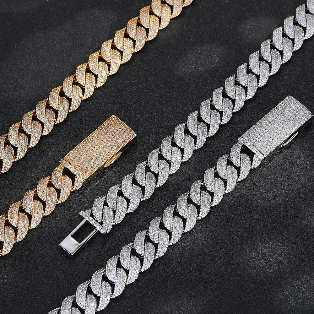 Pavé box clasps on gold- and silver-tone Cuban chains, with the silver clasp open